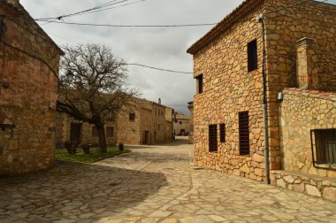 Medinaceli köy bizim yürüyüş güzel taş evler. Mimari, tarih, seyahat. 19 Mart 2016. Medinaceli, Soria, Castilla Leon, İspanya.