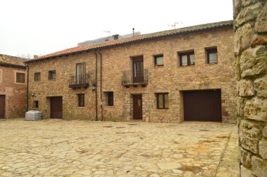 Medinaceli köy bizim yürüyüş güzel taş evler. Mimari, tarih, seyahat. 19 Mart 2016. Medinaceli, Soria, Castilla Leon, İspanya.