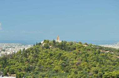 Philopapos, anıt hill Philopapos görülen üzerinden Acropolis Atina'nın üstünde. Mimari, tarih, seyahat, manzara. 9 Temmuz 2018. Atina Yunanistan.