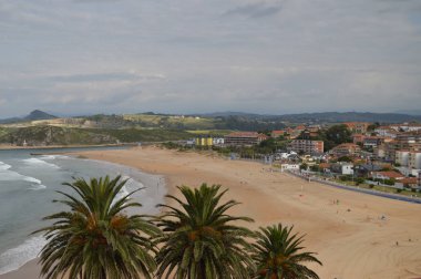 Beautiful And Extensive Beach Of The Shells In Suances. August 26, 2013. Suances, Cantabria. Vacation Nature Street Photography. clipart