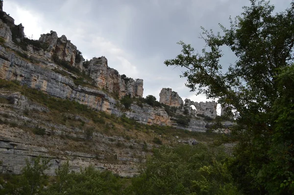 Set of Natural Calcareous Structures that are part of a karst complex of the Ebro River Canyon passing through Orbaneja del Castillo. August 28, 2013. Orbaneja Del Castillo, Burgos, Castilla Leon, Spain. Vacation Nature Street Photography.