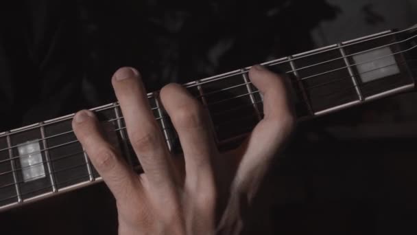 Guitar playing. Male hands with electric guitar. — Stock Video