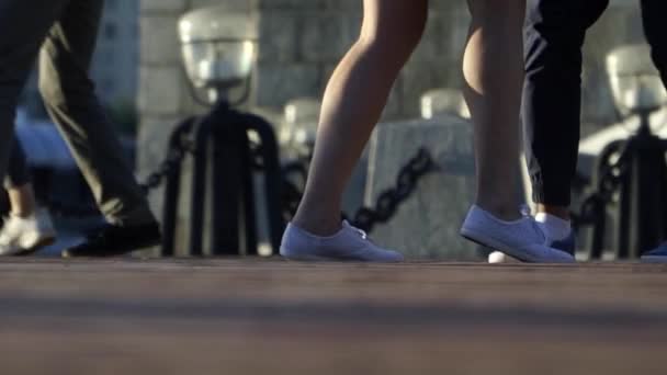 Peoples feet move in slow motion dance — Stock Video