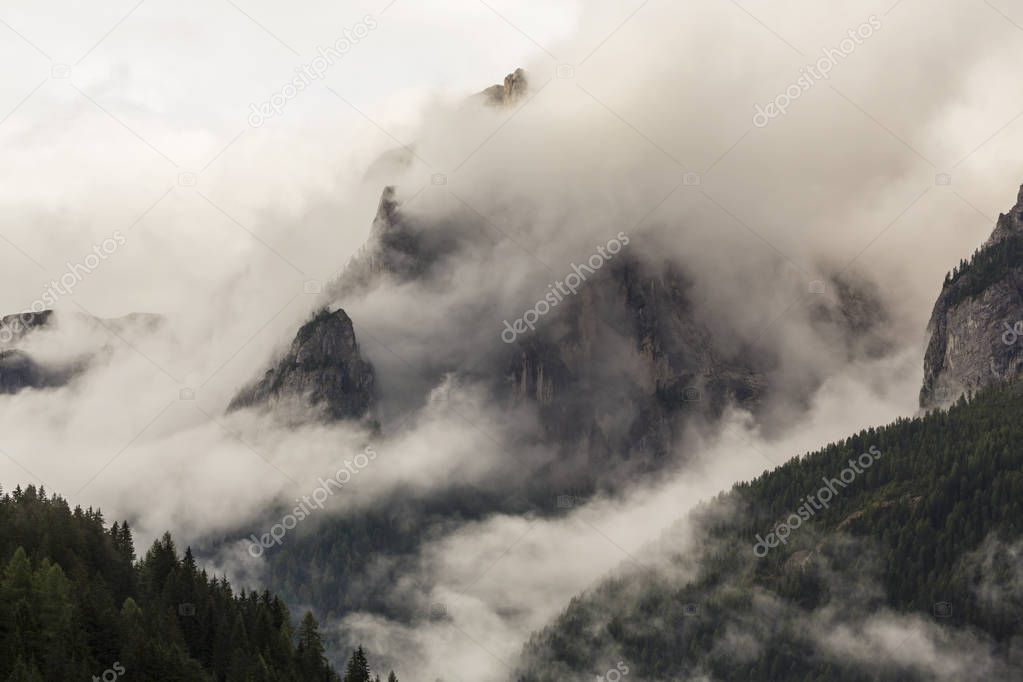 Dramatic cloudscape and rain clouds in the Dolomite Alps, Italy, in summer
