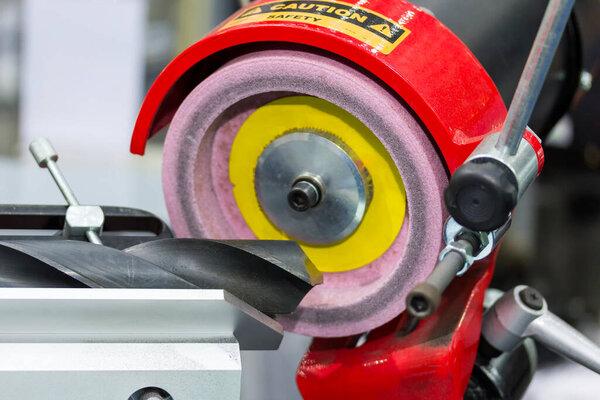 End mill or drills resharpening by sharpener machine at factory