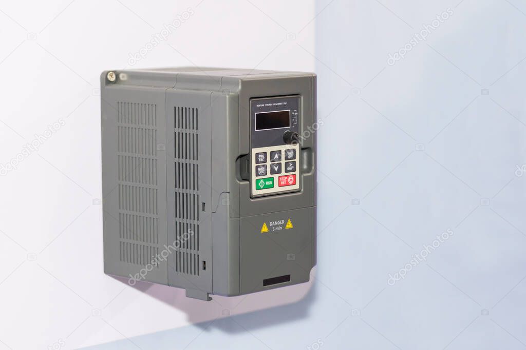 Universal inverter for electric current vector control & supply for industrial on white wall