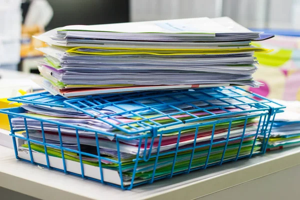 file folder and Stack of business report paper file on the desk in an office