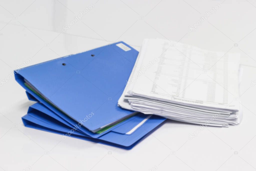 file folder with documents and documents. retention of contracts 