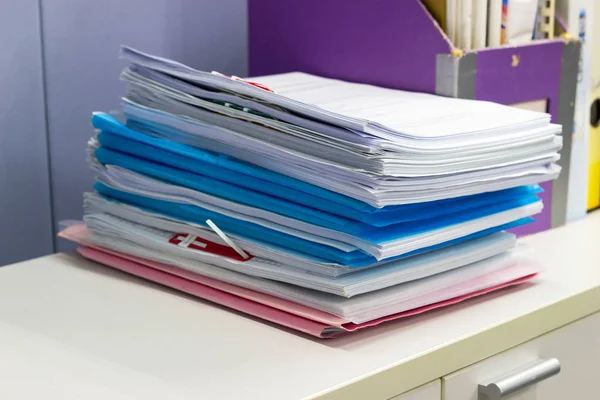 file folder and Stack of business report paper file on the table in a work office, concept document in work office