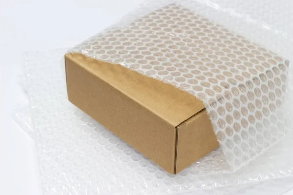 Bubble Wrap Protection Product Brown Box Cracked Insurance Transit Concept — Stock Photo, Image