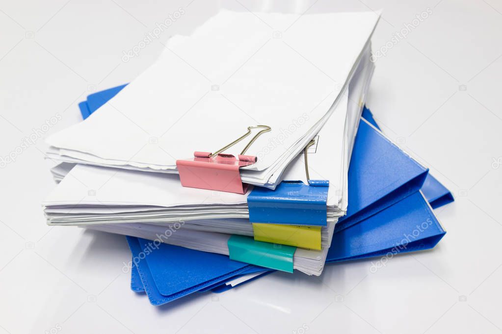 Blue files folder and paper on white table in office, concept Office supplies