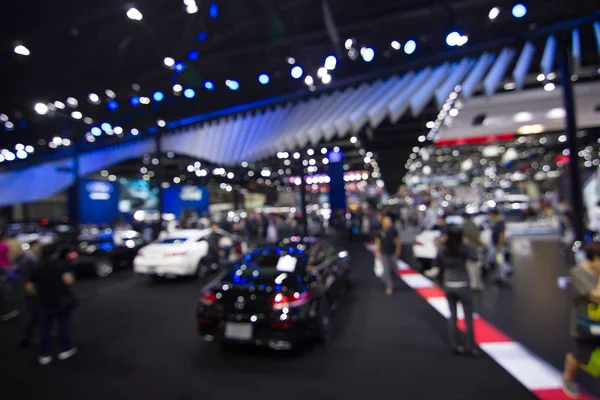 Abstract Blurred, at public event exhibition hall showing cars and new model, new innovation