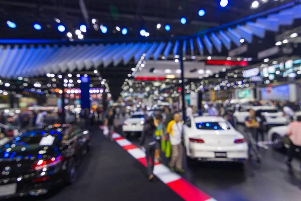 Abstract Blurred, at public event exhibition hall showing cars and new model, new innovation
