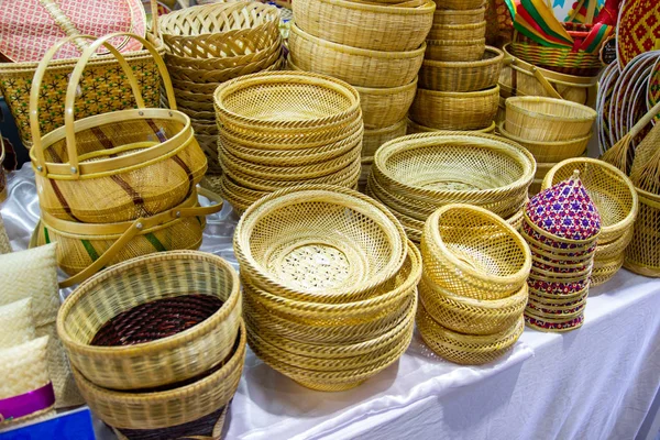 Community Products Weaving A Wicker Basket basketry, fruit basket products By Handmade, in a market of Thailand