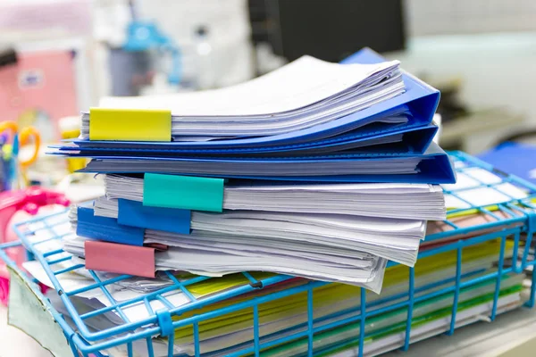 file folder and Stack of business report paper file on the table in a work office, concept document in work office