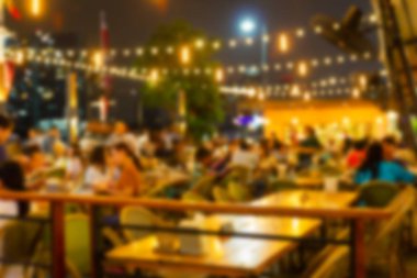 görüntü bir restoran gece festivalin bulanıklık ve atmosfer mutlu ve huzurlu tatil Bangkok Tayland.