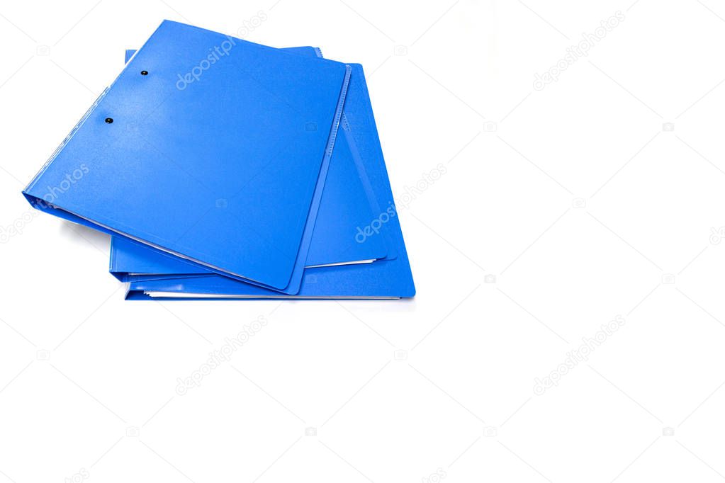 Blue files folder and paper on white table in office, concept office supplies copy space