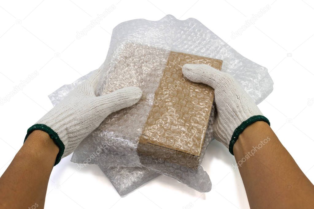 hand man hold bubble wrap, for Packing and protection product cracked or insurance During transit isolated.