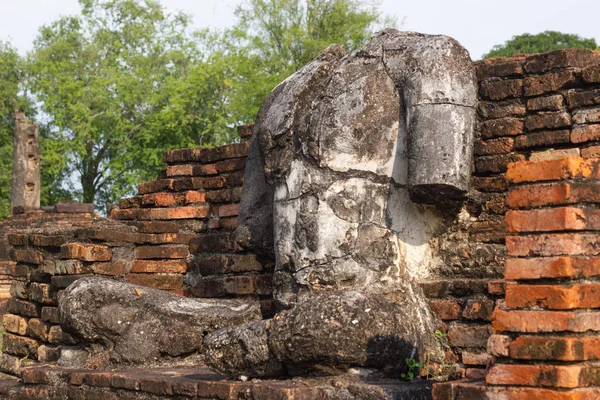 The old buddha image on cement with ruins and ancient, Built in modern history in historical park is the UNESCO world heritage, Sukhothai Thailand.