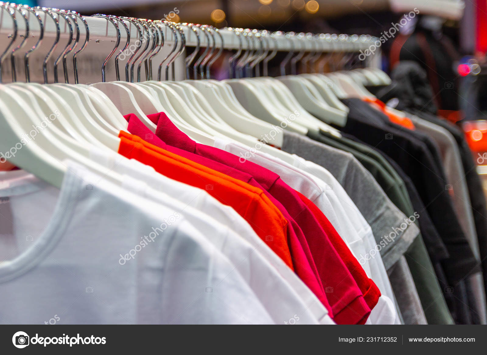 https://st4.depositphotos.com/14709026/23171/i/1600/depositphotos_231712352-stock-photo-colorful-shirt-hangers-sale-department.jpg