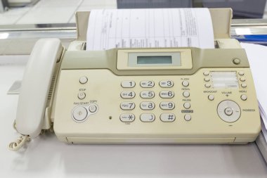 The fax machine for Sending documents in the office concept equipment needed in office clipart