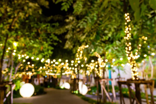 Blurred Image Decorative Outdoor String Lights Hanging Tree Garden Night — Stock Photo, Image