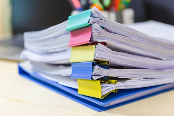 file folder and Stack of business report paper file on the table in a work office, concept document in work office