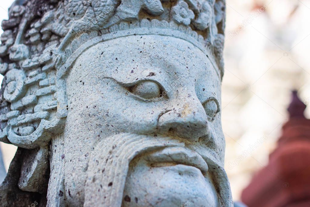 Closeup Face of The Chinese stone statues In the place of Wat Arun, Thailand 