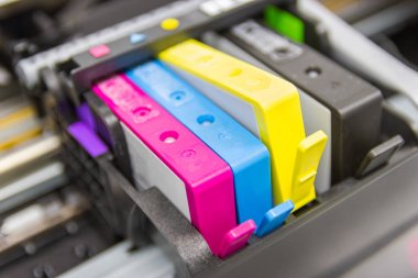 Close up color printer ink jet cartridge of the printer inject  clipart