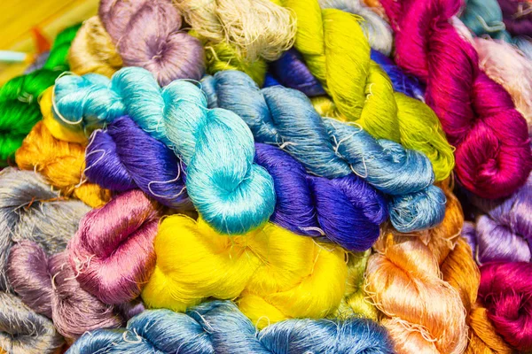 The silk yarn is obtained from a silkworm, Household handicrafts — Stock Photo, Image