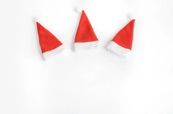 Three Small Christmas Red Hoods White Background — Stock Photo, Image