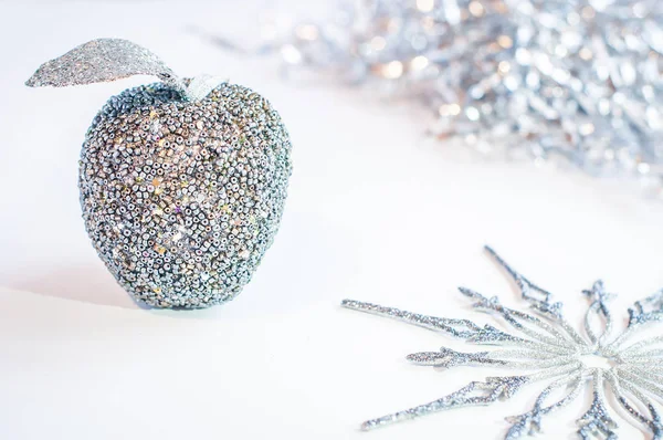 Sparkly Silver Apple White Background Silver Snowflake Tinsel New Year — Stock Photo, Image