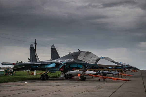 Russian military fighter bomber planes Su-34 at closed airfield