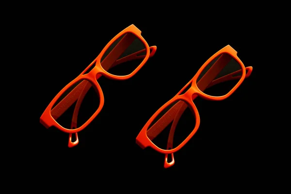 Zwei Orangefarbene Brillen Isoliert Auf Schwarzem Hintergrund Mit Clipping Pfad — Stockfoto