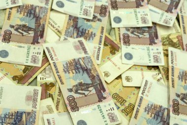 Arka plan beş yüzüncü borçlarından birkaçını Rus banknotlar binlerce