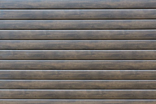 Yatay paralel kahverengi ahşap tahta duvar doku arka plan, ahşap ev duvarları parçası