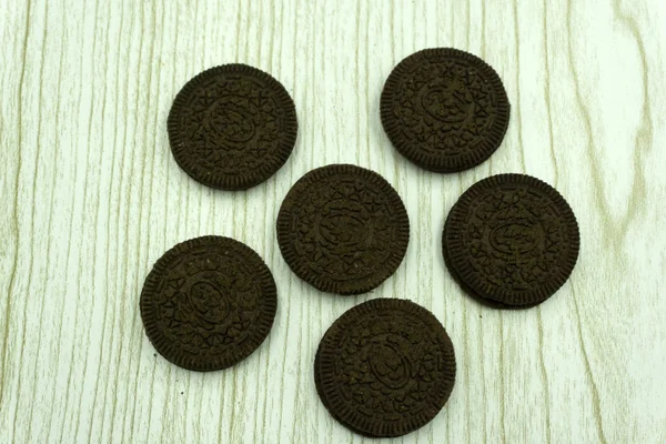 Top view of a single double chocolate cookie isolated on a white background