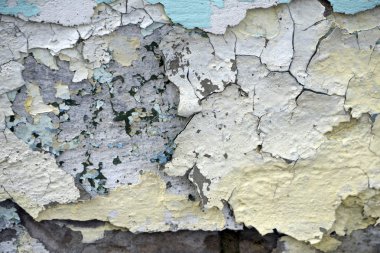 Boya katmanları kadar kapatın, birçok boya ve kağıt katmanları vermek bir soyut doku, yonga boya kapalı makro arka planı yapar