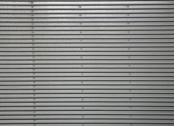 Pared Metálica Corrugada Detalle Una Pared Forrada Metal Acero Brillante —  Fotos de Stock