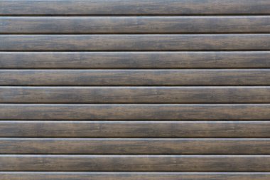 Yatay paralel kahverengi ahşap tahta duvar doku arka plan, ahşap ev duvarları parçası