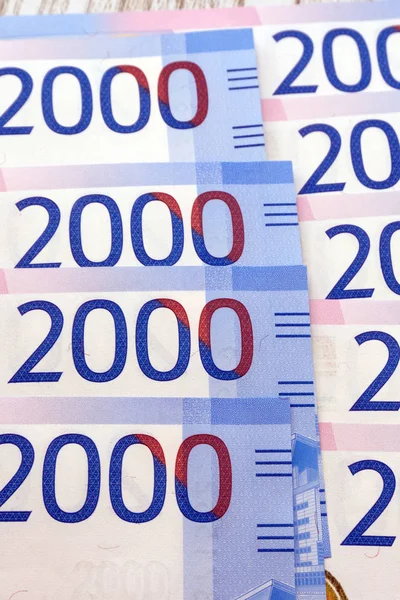 Two thousand rubles with one banknote. New Russian banknote in two thousand rubles in 2017. Cash paper blue money