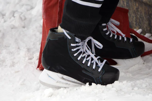 Men\'s hockey skates on a white background