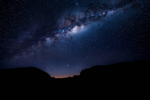 Milky way over the mountains at dusk