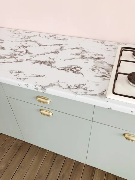 stock image pink green kitchen, marble countertop