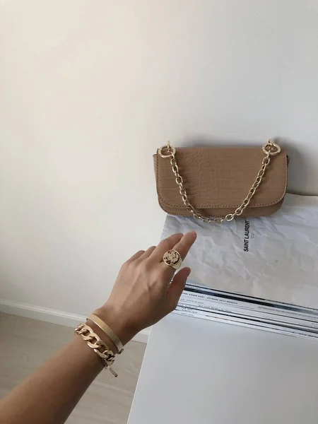 women\'s handbag, arm with chain