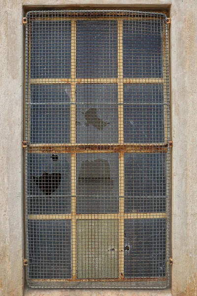Broken Glass Window Panes Rusty Metal Security Grille Concrete Structure — Stock Photo, Image