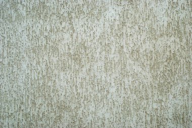 Eskinin dokusu zaman alçısıyla, duvar dokusuyla çatlamış.