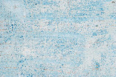 Eski ahşap bir kapının dokusu, soyulmuş boya, mavi renk.