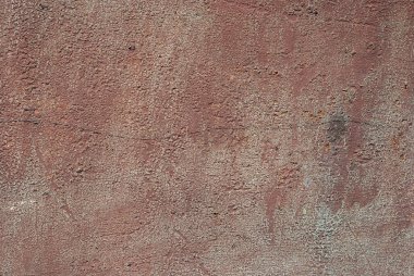 Eskinin dokusu zaman alçısıyla, duvar dokusuyla çatlamış.