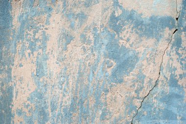 Eskinin dokusu zaman alçısıyla, duvar dokusuyla çatlamış.